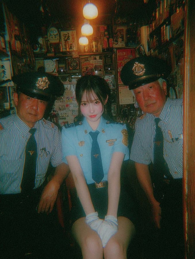 A beautiful Japanese policewoman in light blue uniform
